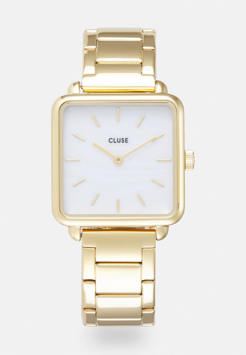 Gold rectangular watch with a white dial, minimalistic gold hour markers, and a polished gold metal bracelet. Features crown for adjustments.