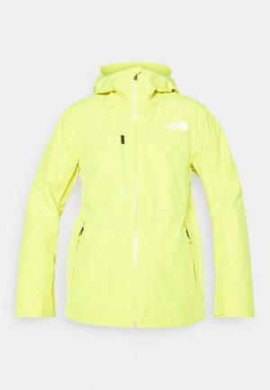 Giacca impermeabile gialla brillante con cappuccio, zip frontale, due tasche laterali e una tasca sul petto. Logo stampato sulla parte superiore sinistra.