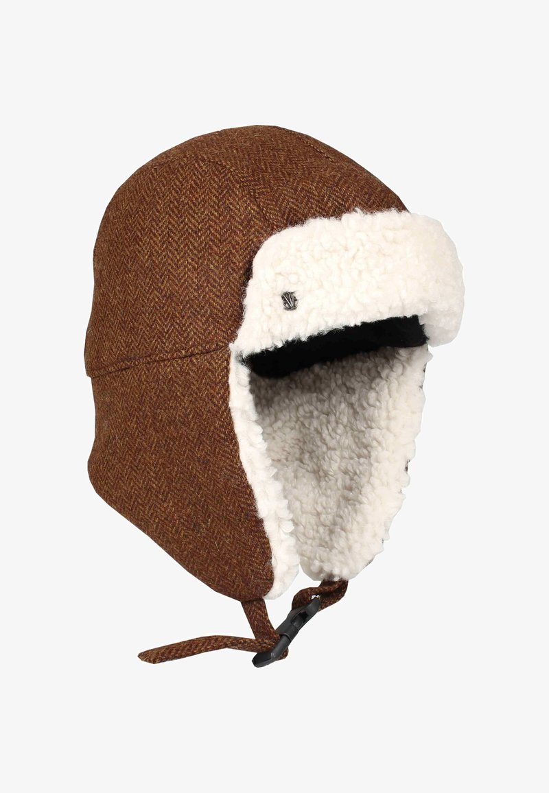 Pruun herringbone-mustriga trapperi müts, valge fliisvoodriga ja kõrva-klappidega, küljel must reguleeritav lõuarihm.