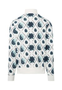 Patroon trui in het wit met een bloemen- en bladdesign in teal en marineblauw, met een ribgebreide kraag en manchetten. Voorkant is niet zichtbaar.