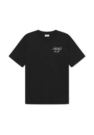 Black cotton t-shirt featuring a round neck, short sleeves, and white embroidered “Les Deux NY, NY” logo on the left chest.