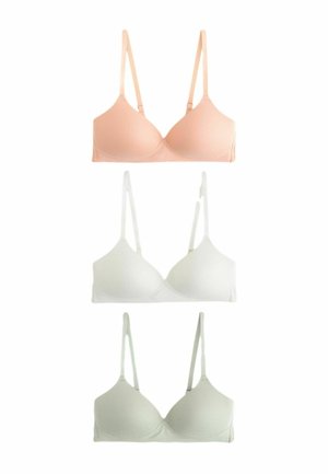 Kolm õmblusteta kergelt polsterdatud rinnahoidjat toonides virsik, valge ja helehall, igaüks reguleeritavate õhukeste õlapaeladega.