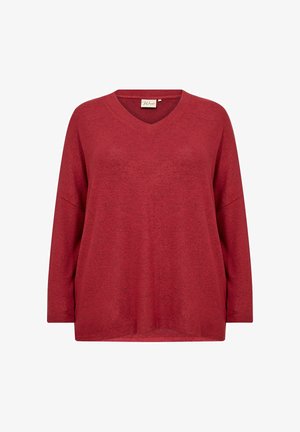 Piros, hosszú ujjú, V-nyakú felső, puha, texturált anyagból készült, laza szabással. Zsúfolt vállakkal és oldalsó hasítékokkal rendelkezik a kényelem érdekében.