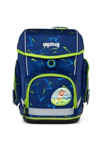 Blue backpack with green accents, geometric patterns, front pocket, reflective strip, and a soccer-themed badge. Ergonomic design for comfort.