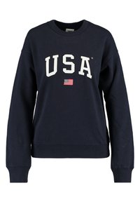 Navy blue sweatshirt made of cotton blend, featuring "USA" in white letters and a small American flag emblem on the chest.