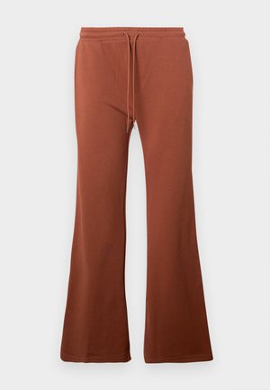 Braune, aus weichem Stoff gefertigte, ausgestellt geschnittene Jogginghosen. Sie verfügen über einen elastischen Bund mit Kordelzug und eine glatte Textur. Keine sichtbaren Muster.