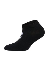 Svart strumpa som når ankeln med ribbat manschett och vitt logodetalj. Mjukt, stretchigt material för komfort och passform; lätt design.