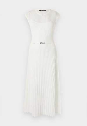Robe blanche côtelée avec un corsage ajusté, des manches courtes et une jupe évasée. Comprend une ceinture à logo signature à la taille.