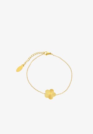 Delikat guldarmbånd med en tekstureret firkløvercharme og justerbar lukning med en oval forlænger.