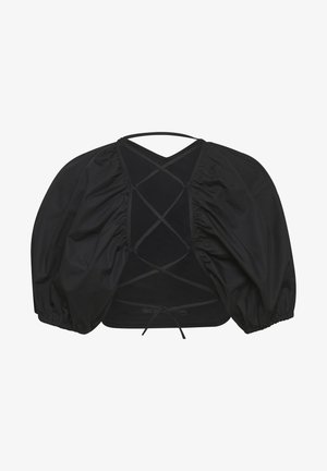 Top corto negro con mangas abullonadas, que presenta un diseño de espalda con cordones y una tela texturizada, creando una silueta volumétrica.