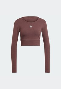 Långärmad crop top i mörk mauve, ribbad textur, med rund halsringning och en liten vit Adidas-logotyp på bröstet.