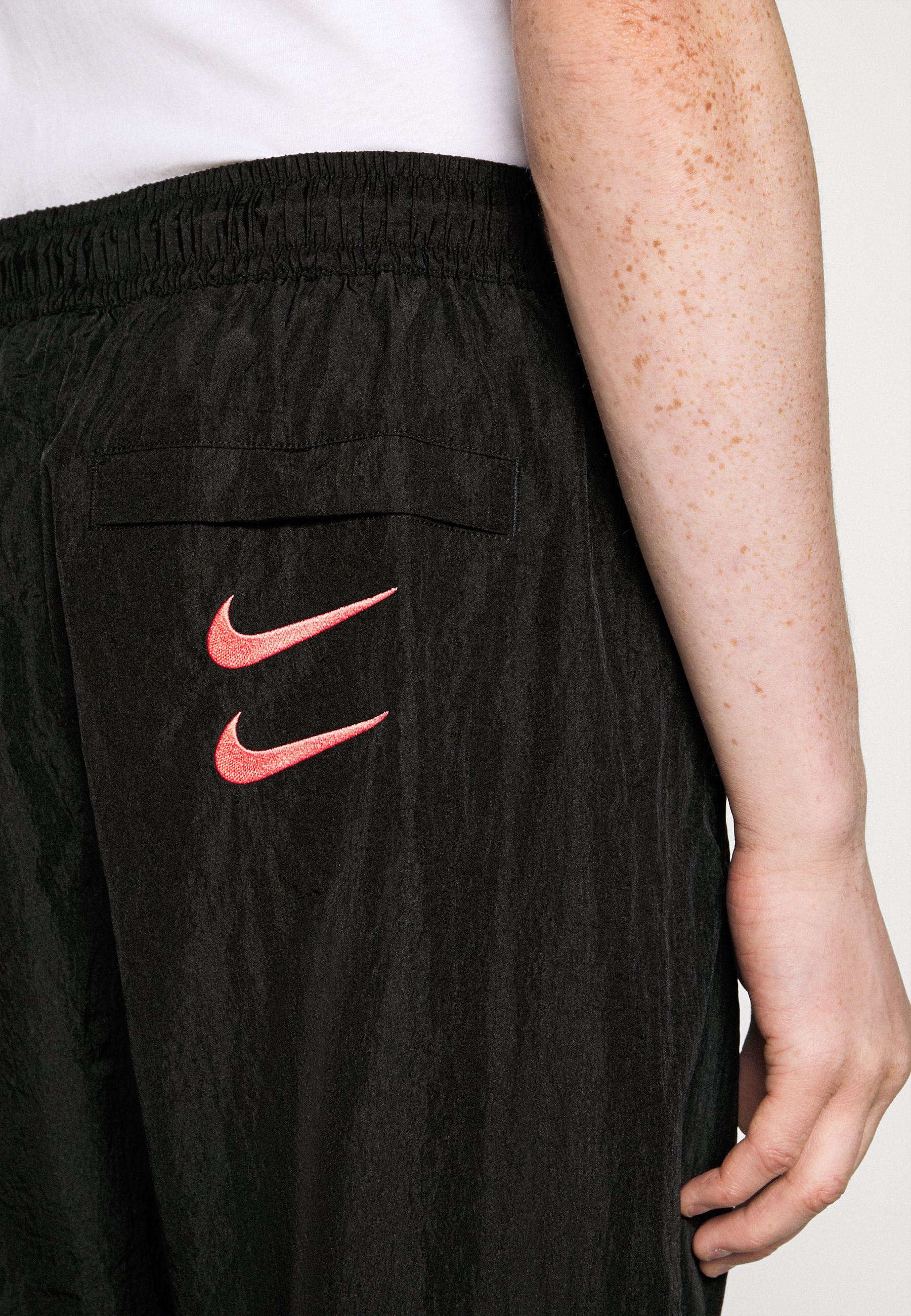 nike pinstripe tracksuit