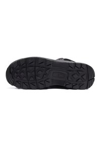 Black rubber outsole with deep tread patterns and grooves for traction. Reinforced edges and a textured surface for durability.