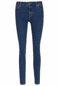 Tmavě modré úzké džíny z denimu, s páskem se středním pasem, pěti kapsami a detaily z měděného kovu.