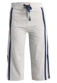 Grå träningbyxor i mjuk bomull, med mörkblå sidostickningar och dragsko i midjan. Knä-långa med sidoklyftor för flexibilitet.