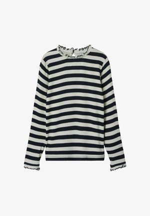 Langermet topp med et marineblått og kremfarget stripemønster, med en flosset halslinning og mansjetter med bølget kantdetalj.