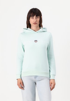 Mint green hoodie in soft fabric, featuring a front logo print and a kangaroo pocket. Complete with a drawstring hood and ribbed cuffs.