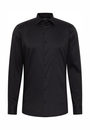 Sorte langærmede skjorte lavet af glat stof, med klassisk krave, frontknaplukning og knapmanchetter. Enkel og elegant design.