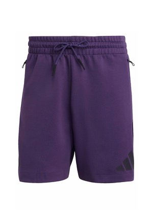 Lilla træningsshorts med elastisk talje, snoretræk og sorte detaljer. Har en glat tekstur og et logo på kanten.