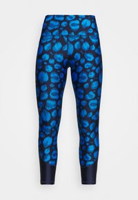 Blåa och svarta capri leggings med ett texturerat leopardmönster, tillverkade av elastiskt och andningsbart material, med släta sömmar.