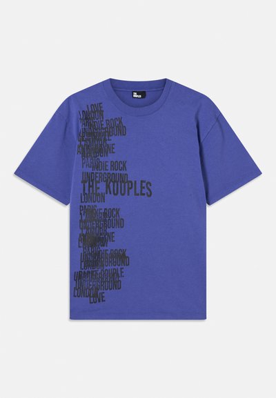 Purple cotton T-shirt featuring black text with city names and phrases arranged vertically on the left side. Crew neckline, short sleeves.
