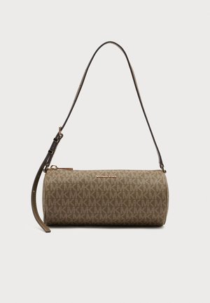Brown cylindrical Michael Kors handbag with repeating MK logo pattern and adjustable shoulder strap on white background.