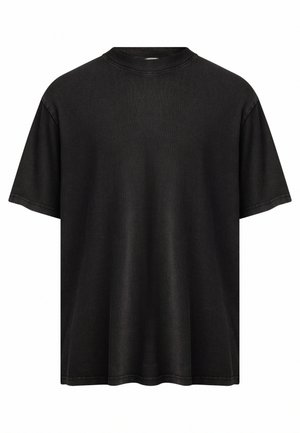 Black oversized t-shirt with a round neckline, short sleeves, and a smooth finish. Features raw hems and a relaxed silhouette.