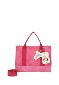 Bolso tote rosa con acentos en rosa más claro, que presenta patrones de pájaros, dos asas resistentes, una correa desmontable y una etiqueta decorativa con ilustraciones.