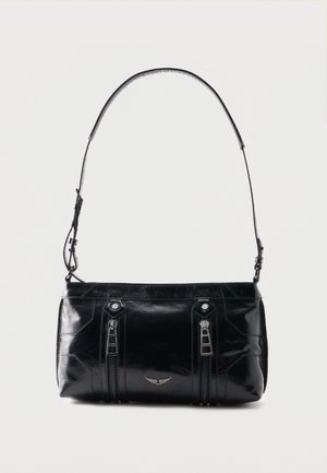 Small glossy black leather shoulder bag with two vertical zipper pockets and adjustable strap.