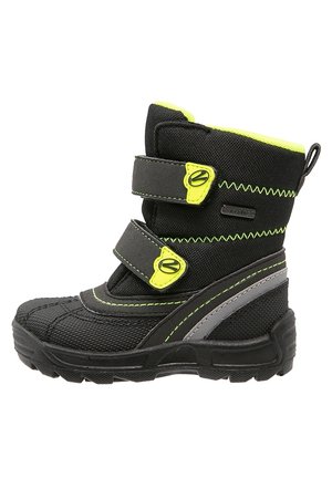 Botte d’hiver enfant noire et jaune néon avec double bande Velcro, bande réfléchissante et semelle robuste pour temps froid.