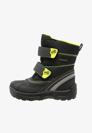 Botte d’hiver enfant noire et jaune néon avec double bande Velcro, bande réfléchissante et semelle robuste pour temps froid.