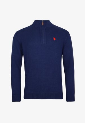 Granatowy sweter z pół-zamkiem, z prążkowanymi mankietami i dołem, oraz małym czerwonym haftowanym logo na lewej piersi. Miękka tekstura.