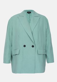 Blazer de corte sobredimensionado con doble botonadura en un suave verde menta. Confeccionado en una tela lisa, cuenta con dos bolsillos frontales tipo parche y botones negros.