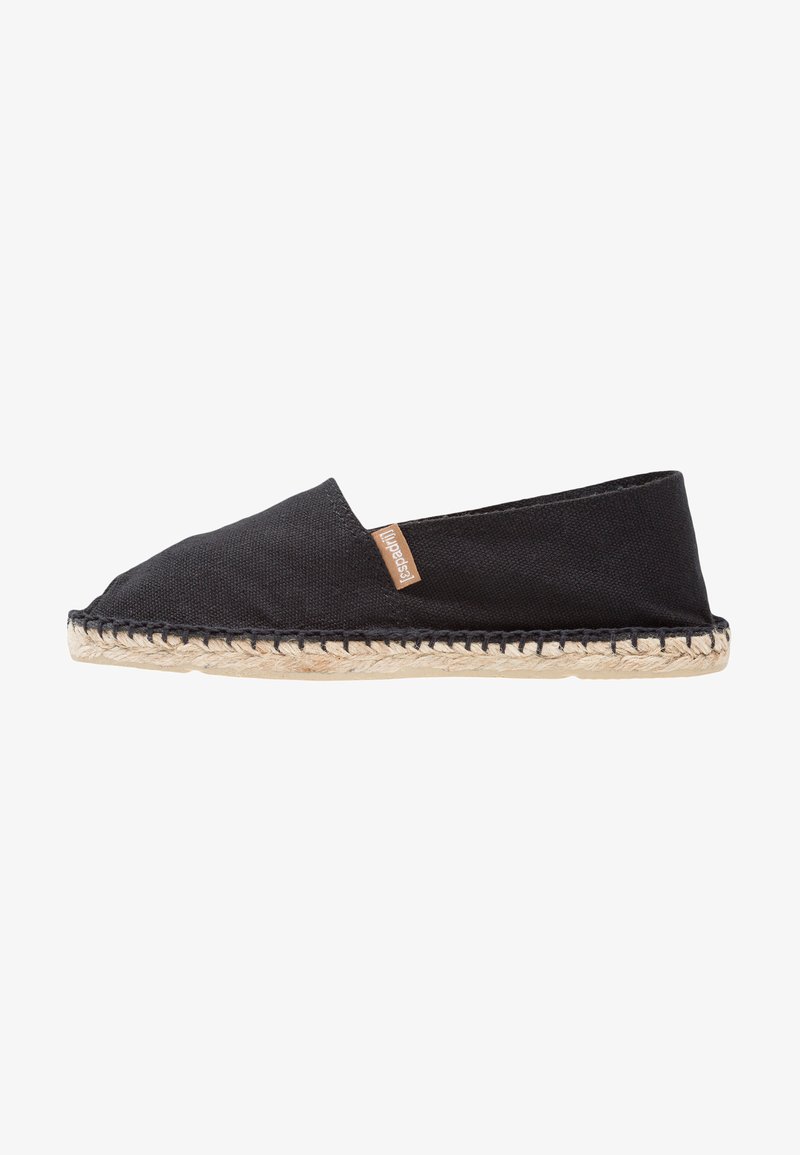 Black canvas espadrille shoe with a rounded toe, jute rope outsole, and a small tan tag on the side. Simple and minimalist design.