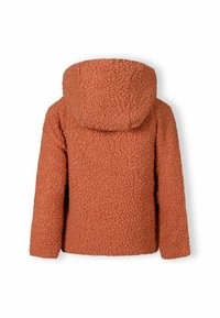 Narancssárga bolyhos dzseki textúrált, plüss külsőrésszel és nagy kapucnival. Lazább fazonú, hosszú ujjú.