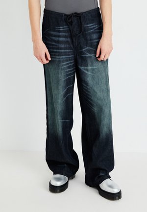 - Jeansy Relaxed Fit