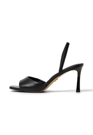 Schwarze Leder-Sandalette mit offenem Zehenbereich und dünnem Riemchen hinten, schlankem Stilettoabsatz und brauner Sohle.