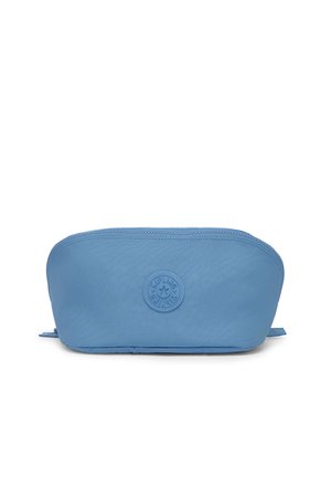 Bolsa azul con cremallera, parte superior redondeada y parche circular con logo en el centro del lado frontal, mostrada sobre fondo blanco.