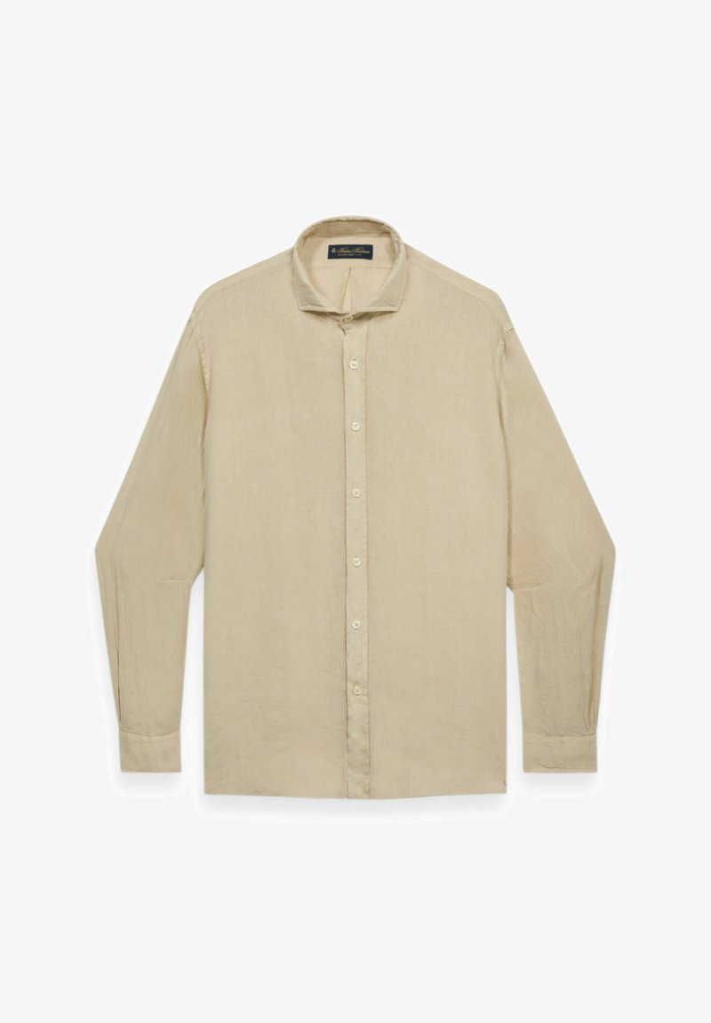 Chemise beige à manches longues avec col standard, poignets à boutons et label à l'intérieur de l'encolure.