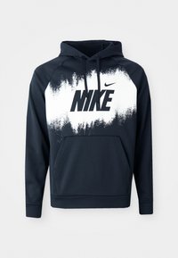 Marineblå hettegenser med en hvit gradient og svart "NIKE"-logo. Har kengurulomme, snor i hetten og ribbestrikkede cuffs.