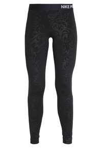 Czarne legginsy wykonane z elastycznego materiału, z tonowymi wzorami florystycznymi, dopasowanym krojem i markowym pasem z napisem "NIKE PRO".