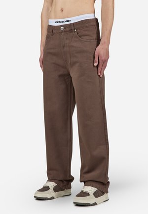 Brown wide-leg jeans made of denim with a smooth texture. Features a button fly, five pockets, and a branded waistband.