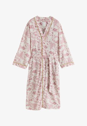 Peignoir crème avec motif floral rose, bordure dorée le long des bords, manches longues, ceinture à la taille et deux poches avant.