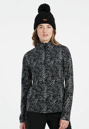 Schwarzer Langarmpullover mit halbem Reißverschluss und einem weiß gesprenkelten Muster. Warme Strickmütze mit Pom-Pom. Weicher, stretchiger Stoff.
