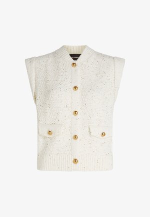 Bela pletena brezrokavnika z teksturirano površino, ki ima zlate gumbe in dve sprednji žep. Brezrokavni dizajn z rebrastim robom in ovratnikom.