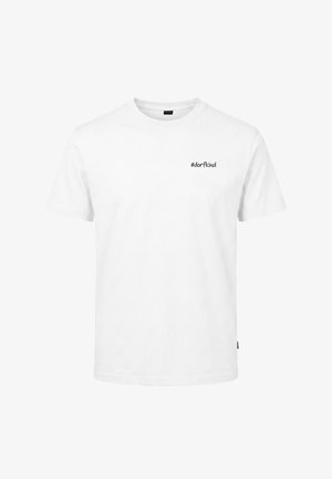 T-shirt blanc à manches courtes avec un petit texte noir "#dorfkind" sur la zone gauche de la poitrine, présenté sur un fond blanc uni.