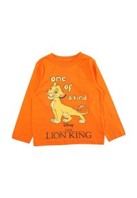 Chemise orange à manches longues pour enfants, présentant un motif de lionceau et le texte « unique en son genre » tiré du film "Le Roi Lion" de Disney. Tissu en coton.