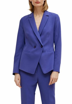 Tailored double-breasted blazer in vibrant royal blue. Features notched lapels, two front pockets, and structured shoulders. Smooth fabric.