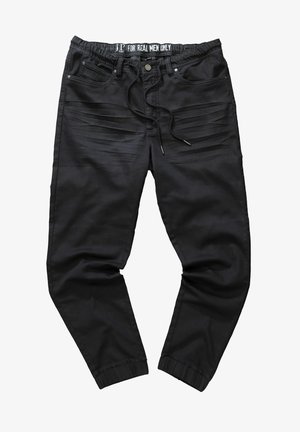 Schwarze Jogginghosen mit einem Kordelzugbund, elastischen Bündchen, Fronttaschen und strukturierten Streifen entlang der Oberschenkel. Glatte Stoffoberfläche.