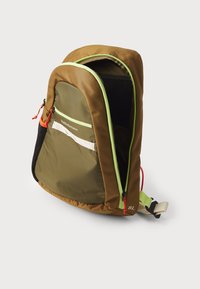 Brown and green backpack with contrasting bright green accents, textured fabric, front zip pocket, and adjustable strap. Capacity: 8L.